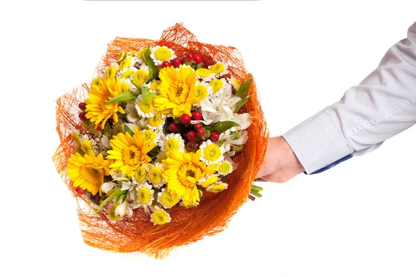 Bouquet of flowers in man's hand — Stock Photo, Image