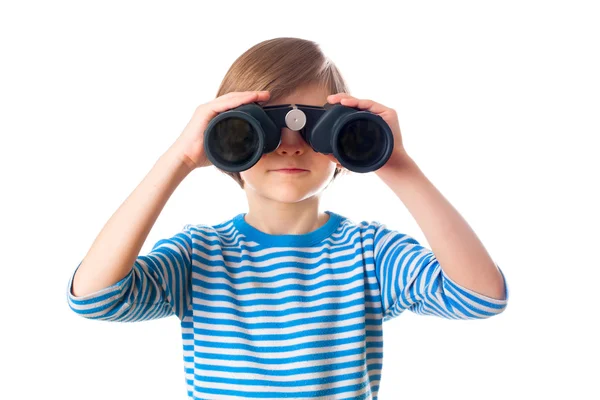 Little boy is looking through binocular — Stock Photo, Image