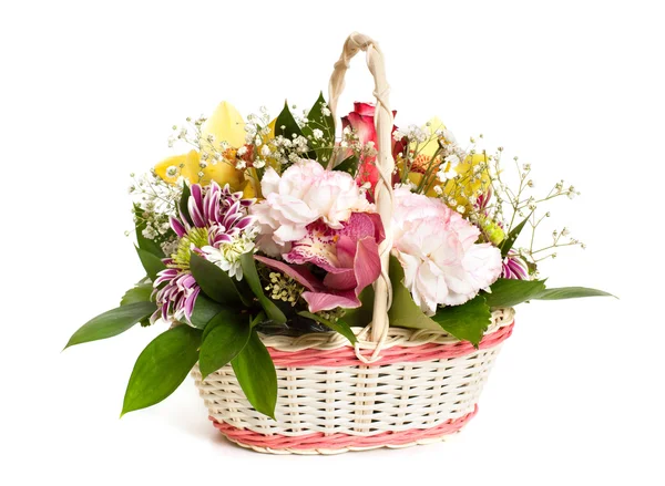 Wicker basket of mixed flowers — Stock Photo, Image