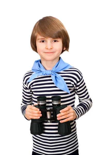 Kleine jongen is op zoek via verrekijker — Stockfoto