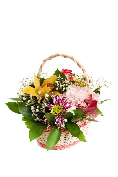 Wicker basket of mixed flowers — Stock Photo, Image