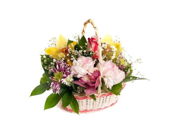 Wicker basket of mixed flowers — Stock Photo, Image