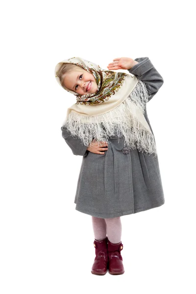 Little girl in Russian kerchiefs is dancing — Stock Photo, Image