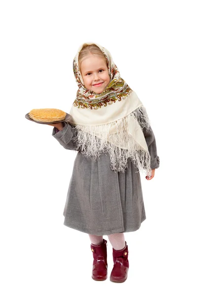 Niña con un plato de panqueques — Foto de Stock