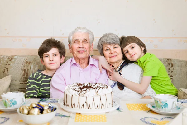 Senior man with holiday cake — Stock Photo, Image