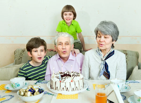 Senior man with holiday cake — Stock Photo, Image