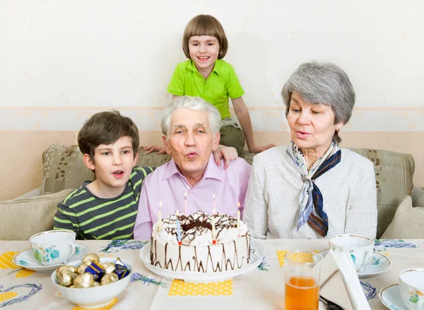 Senior man with holiday cake — Stock Photo, Image