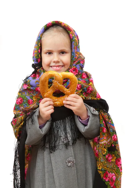 Girl in kerchief with cracknel — Stock Photo, Image