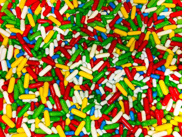 Fond texture coloré différents bonbons sucrés gros plan — Photo