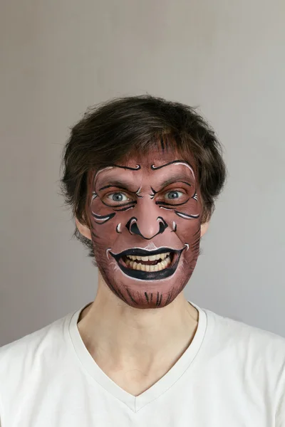 Malowanie twarzy małpa — Zdjęcie stockowe