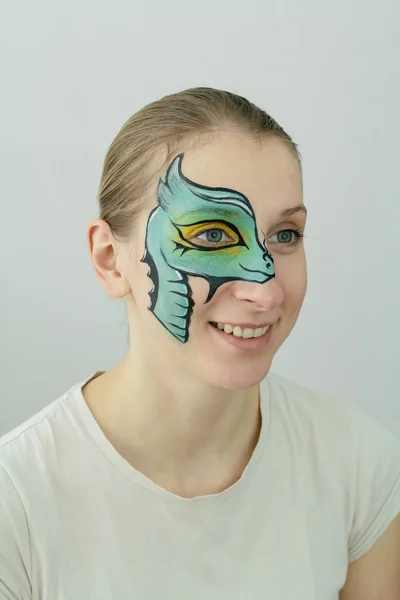 Green dragon face painting — Stock Photo, Image