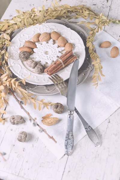 Christmas decoration table servise with almonds, cutlery and oth — Stock Photo, Image