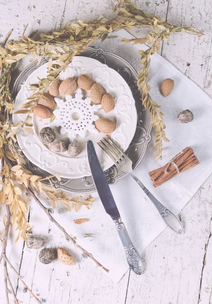 Christmas decoration table servise with almonds, cutlery and oth — Stock Photo, Image