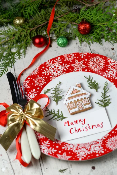 Christmas decoration for the table with red dish and cutlery — Stock Photo, Image