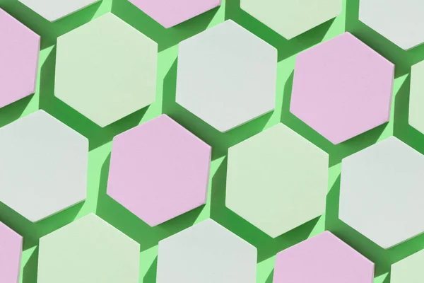 Podiums hexagonaux avec ombre proéminente sur fond vert lime — Photo