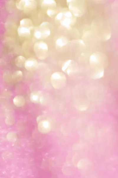 Homályos bokeh háttér rózsaszín és arany csillogás — Stock Fotó