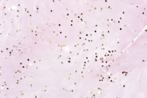 Pink fluffy feathers with gold glitter Stock Photo