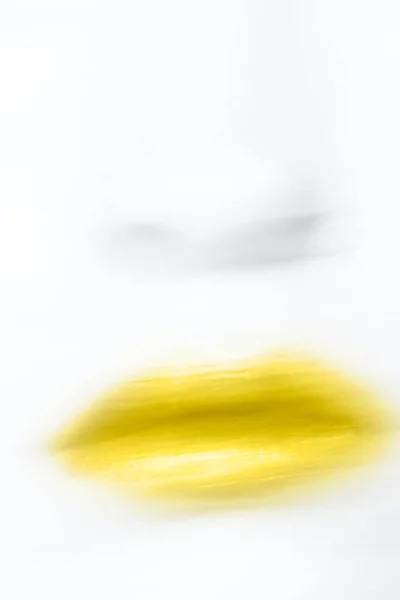 Close up of defocused motion blur lips with illuminating lipstick toned — Stock Photo, Image