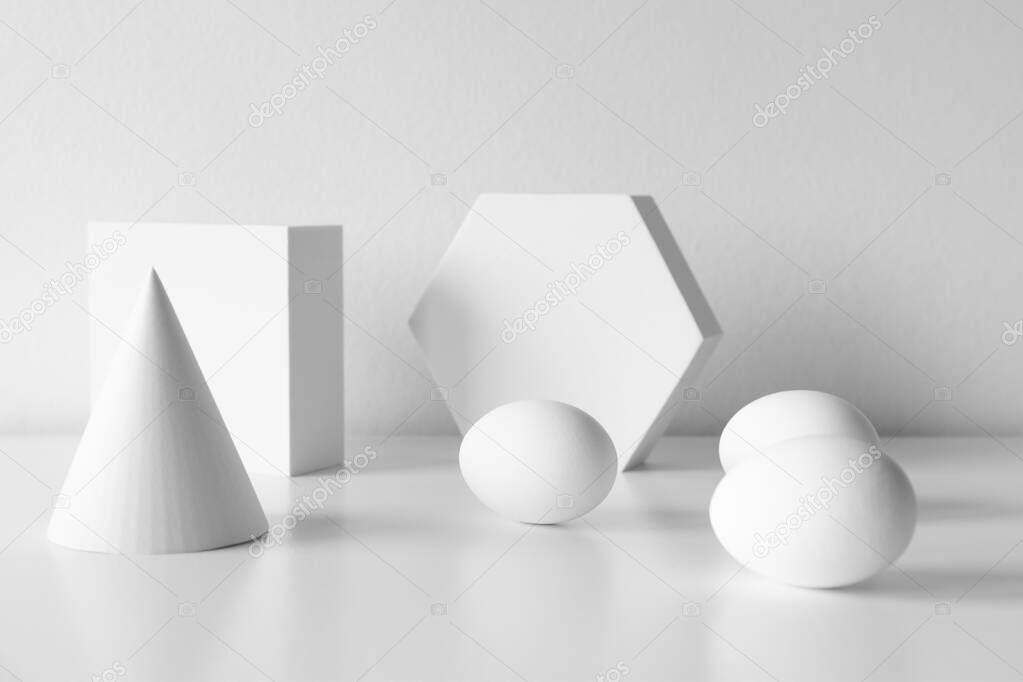 mid century moder composition of geometric shapes with egg