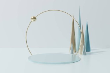 Mavi podyum, altın kemer şekilli halkalar ve mavi ve altın renkli uçan küreler, mavi arka plandaki koniler gibi.