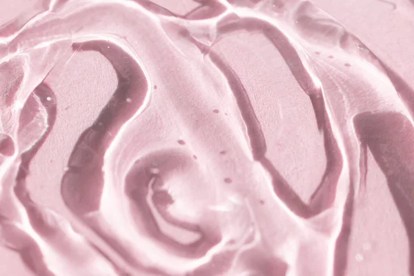 Rosa transparent gel makro närbild struktur med selektivt fokus — Stockfoto