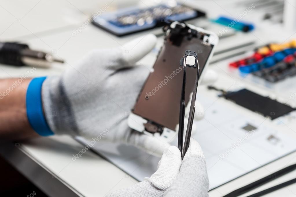 Close-up photos showing process of mobile phone repair