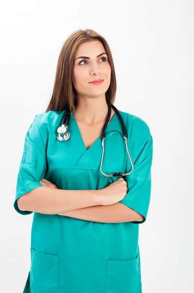 Woman in medical doctor uniform and stethoscope — ストック写真