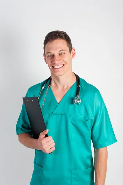 Portrait of a friendly doctor smiling, — Stock Photo, Image