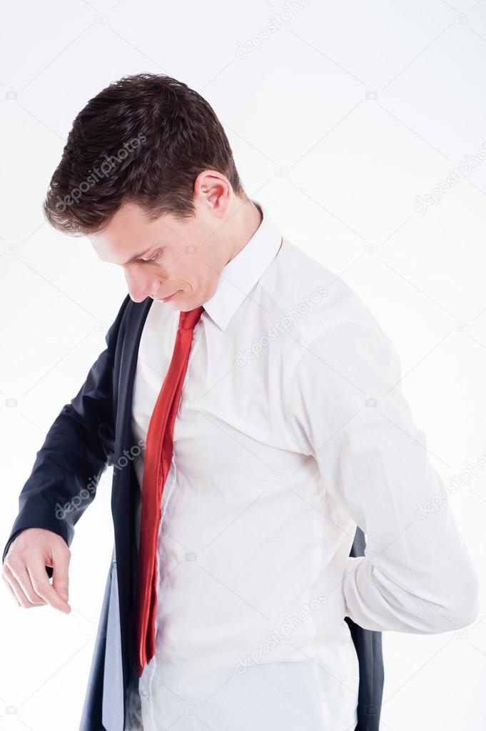 Young businessman dressing up