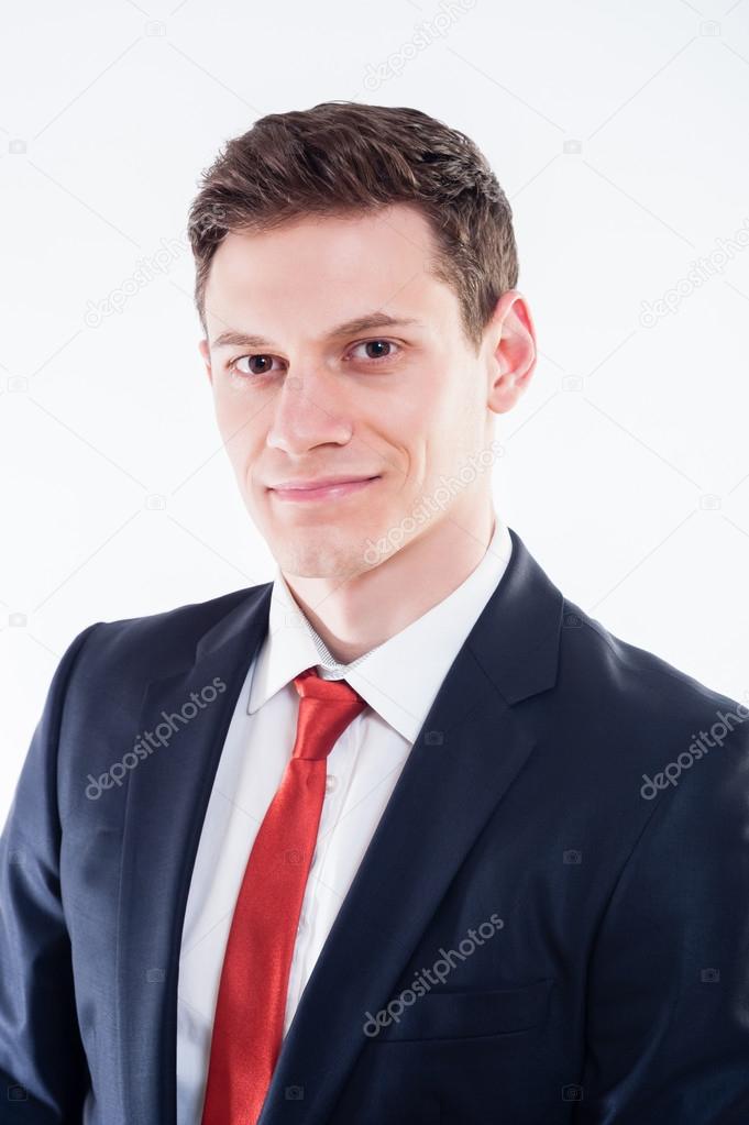 Businessman in black suit and red tie