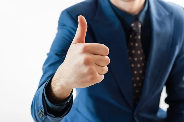 Close-up of young businessman making ok sign with hand, — Stock Photo, Image