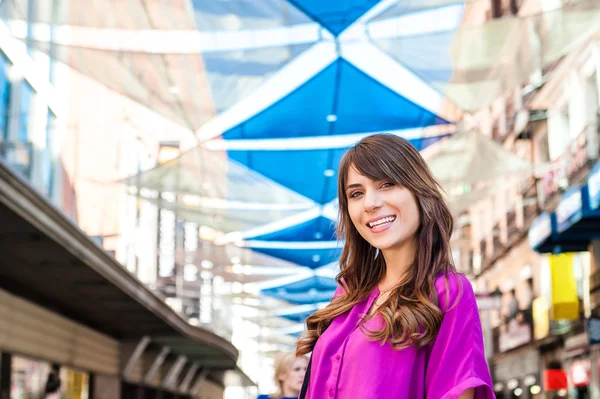 Young woman tourist in Plaza del Sol, Madrid, Spain, taking a walk and enjoying the city — Stock Fotó