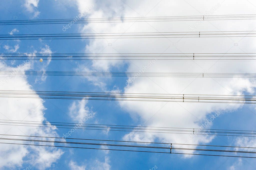 Electricity power line with clear blue sky background