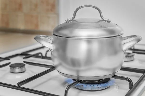 Pan on a gas stove — Stock Photo, Image