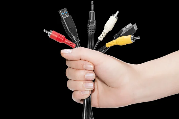 Diferentes cables en la mano — Foto de Stock