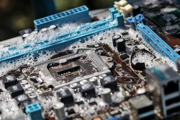 Clean the computer motherboard with water and detergent.