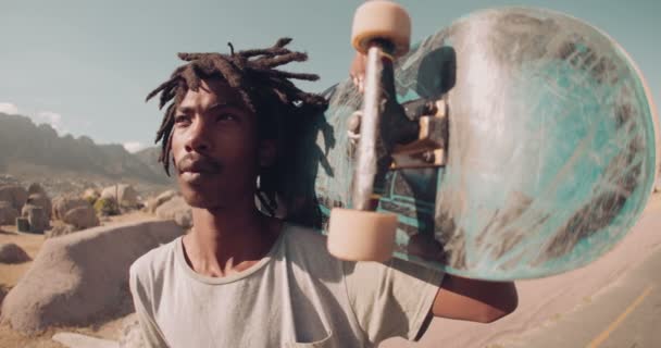 Close up of Skater Holding Skateboard Outside — Stock Video