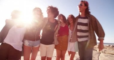 friends embracing each other joyfully