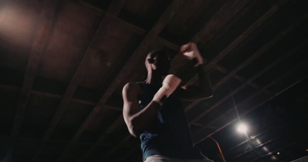 Boxer athlete punching shadow boxing — Stock Video