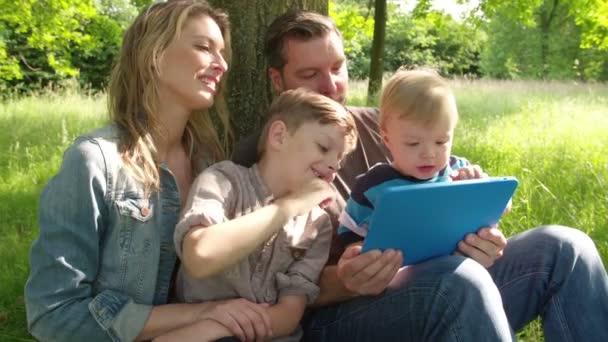 Happy Family with Tablet