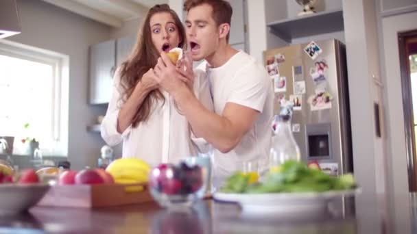 Boyfriend stealing his girlfriends muffin — Stock Video