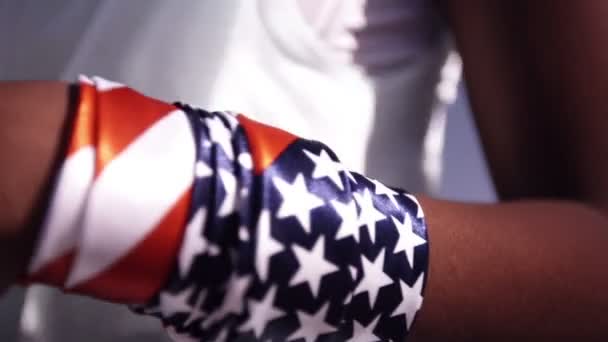 Afro girl with american wristband — Stock Video