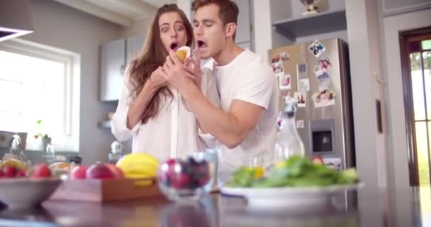 Boyfriend stealing his girlfriend's muffin — Stock Video