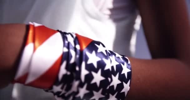 Afro girl with american wristband — Stock Video