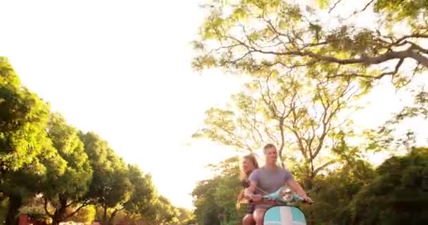 Couple loving a road trip on their scooter — Stock Video