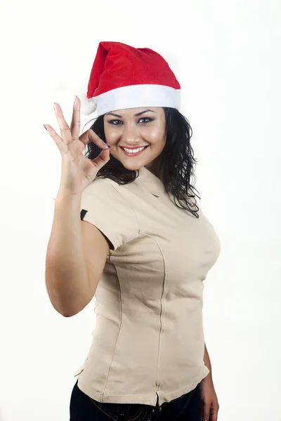 在白色背景上的圣诞帽的女人 — 图库照片