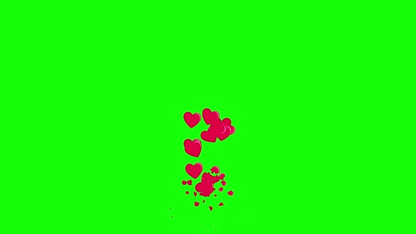 Animation of flying hearts assembled from small puzzles on a green screen. 4k 2d video template — Stock Video