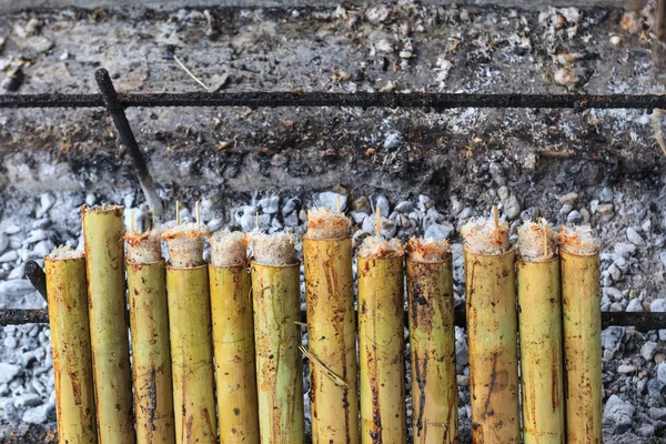 Sticky rice roasted in bamboo