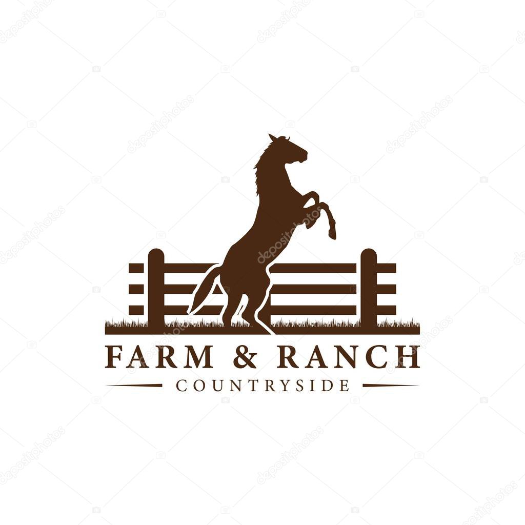 Horse silhouette behind wooden fence paddock for vintage retro rustic countryside western country farm ranch logo design