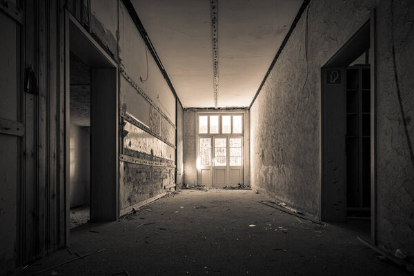 Creepy abandoned asylum with a lot of vandalism and graffiti a forgotten hospital clinic a decayed lost place